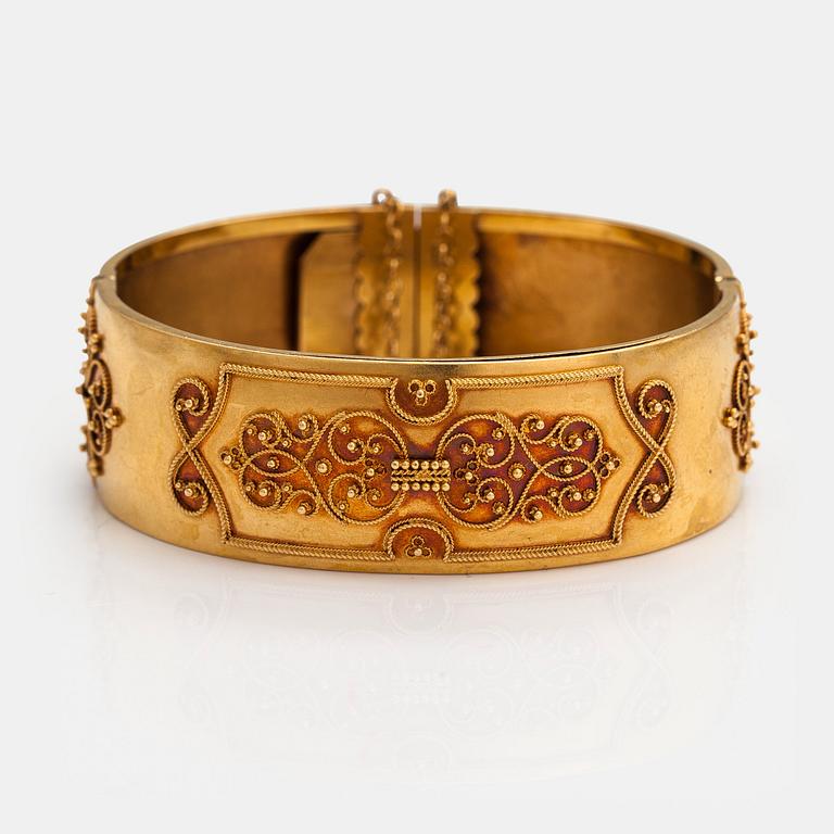 Rannekoru, 18K kultaa. Gustaf Dahlgren, Malmö 1872.