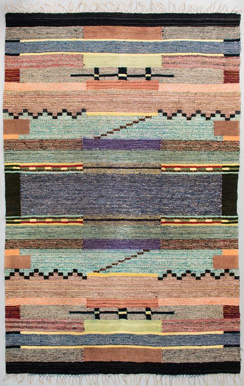 A 1930's Finnish rag rug. Circa 270 x 180 cm.