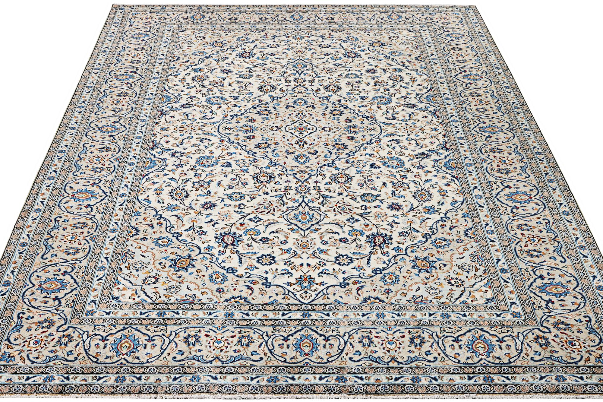 A Kashan carpet, c. 355 x 238 cm.