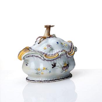 A Swedish Rörstrand faience tureen with cover and stand, 18th Century.
