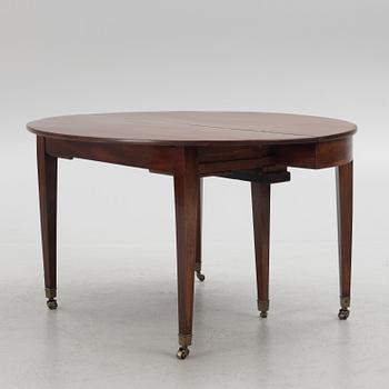 A 19th Century English Dining Table.