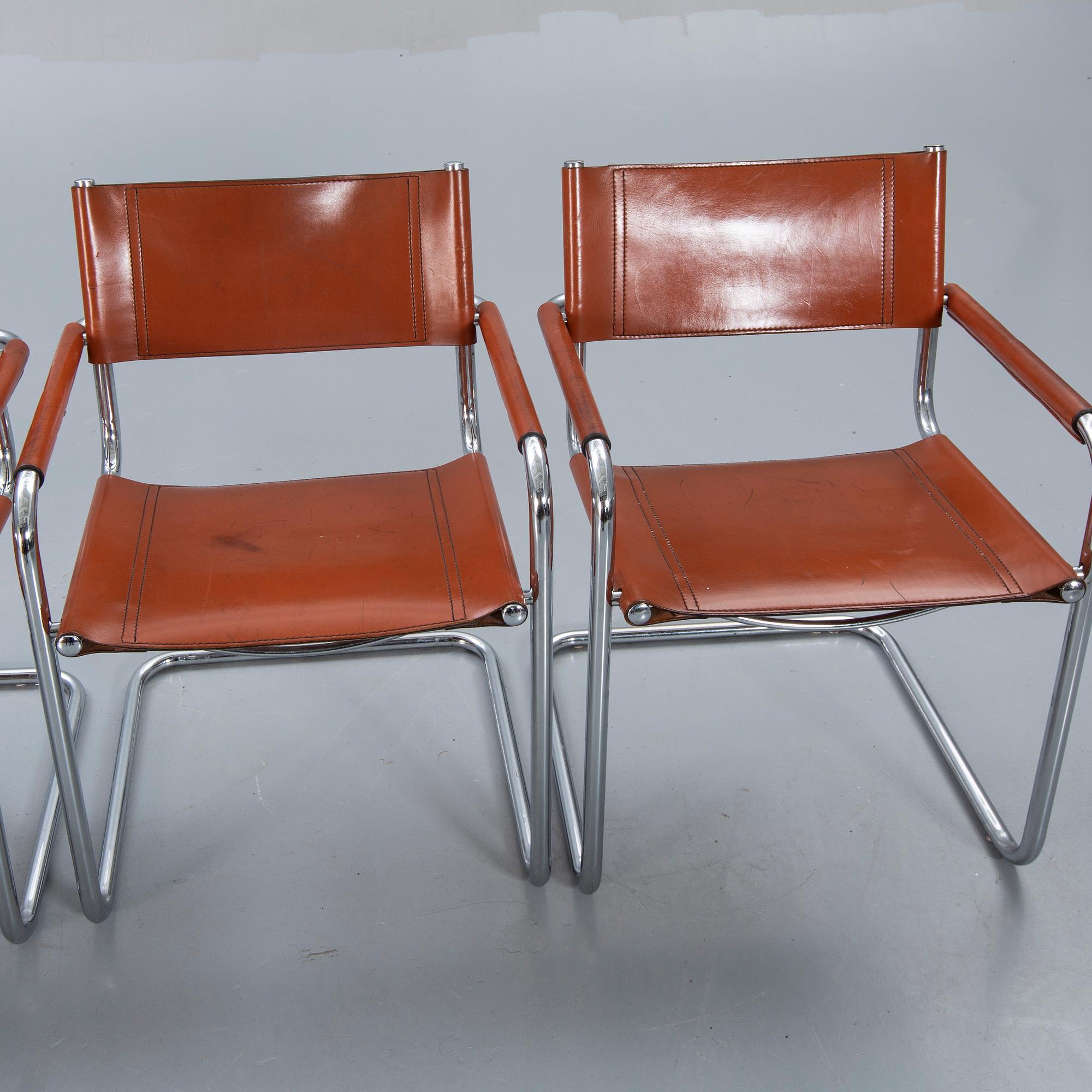 A swet of four Italien leather armchairs later part of the 20th century.