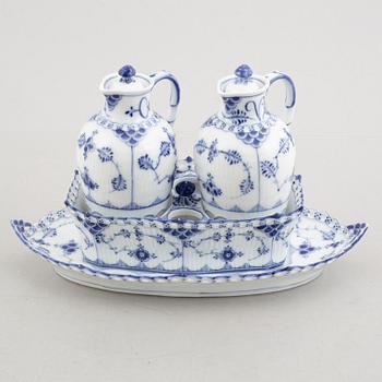 A 'Blue fluted full lace' / 'Musselmalet' porcelain cruet set, Royal Copenhagen, model 1033, 1898-1923.