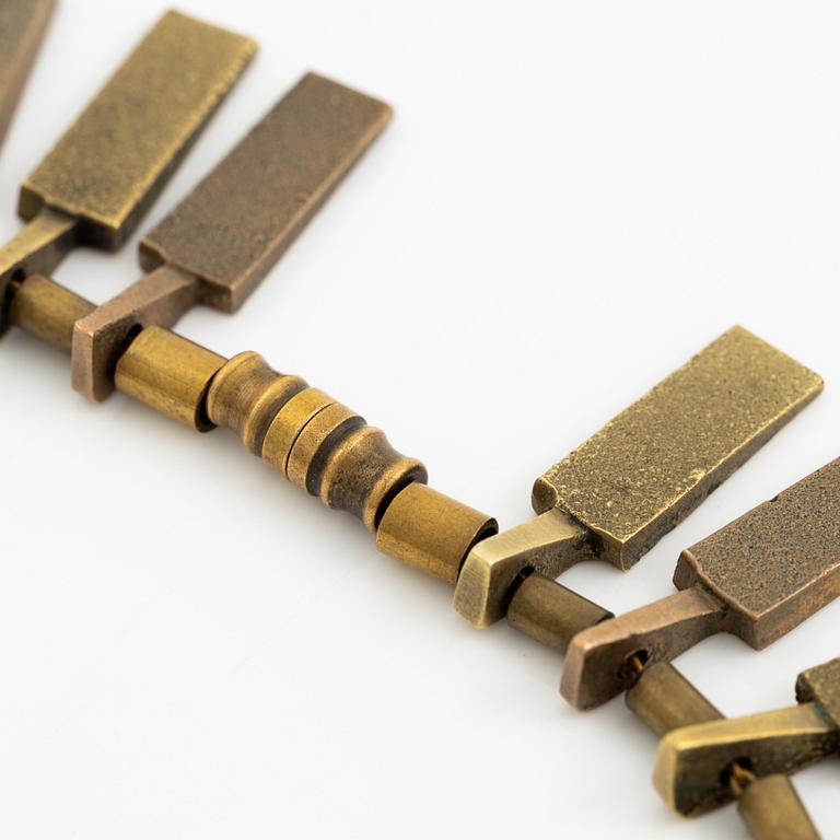 Inga-Britt "Ibe" Dahlquist, a necklace "Nefertiti", bronze.