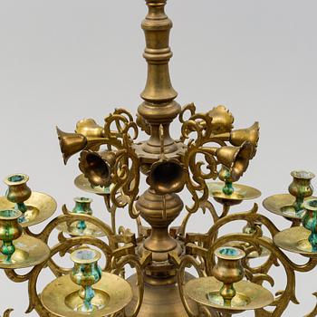 A brass Baroque style chandelier. 20th Century.