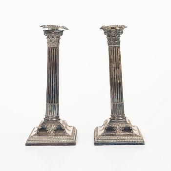A pair of silver plate candlesticks, no marks, 20th century.