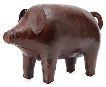 405. A brown leather figure of a pig by Svenskt Tenn.