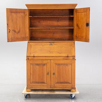 A pine cabinet, circa 1800.