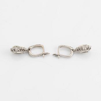 Pear shaped diamond earrings.