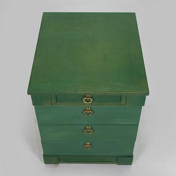 Desk/side table, a chair and a chest of drawers, last quarter of the 20th century.