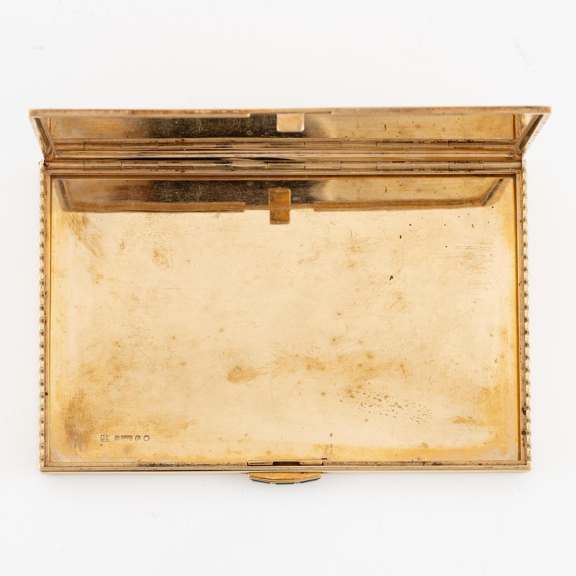 A Cartier 9 carat gold and calibré-cut sapphires cigarette case, London.