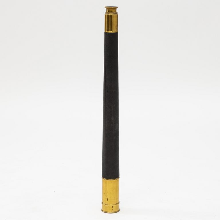 A 20th century telescope on a tripod.
