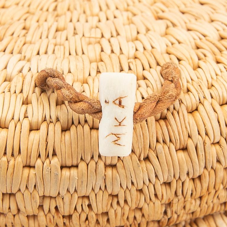 Margit Kitok-Åström, a signed box root work.