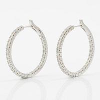 Earrings 18K white gold with brilliant-cut diamonds.