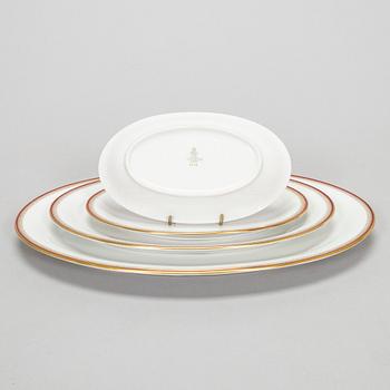 A 60-piece tableware set, Tirschenreuth Bavaria, Germany and nine mocha cups with saucers from Limoges, France, mid.