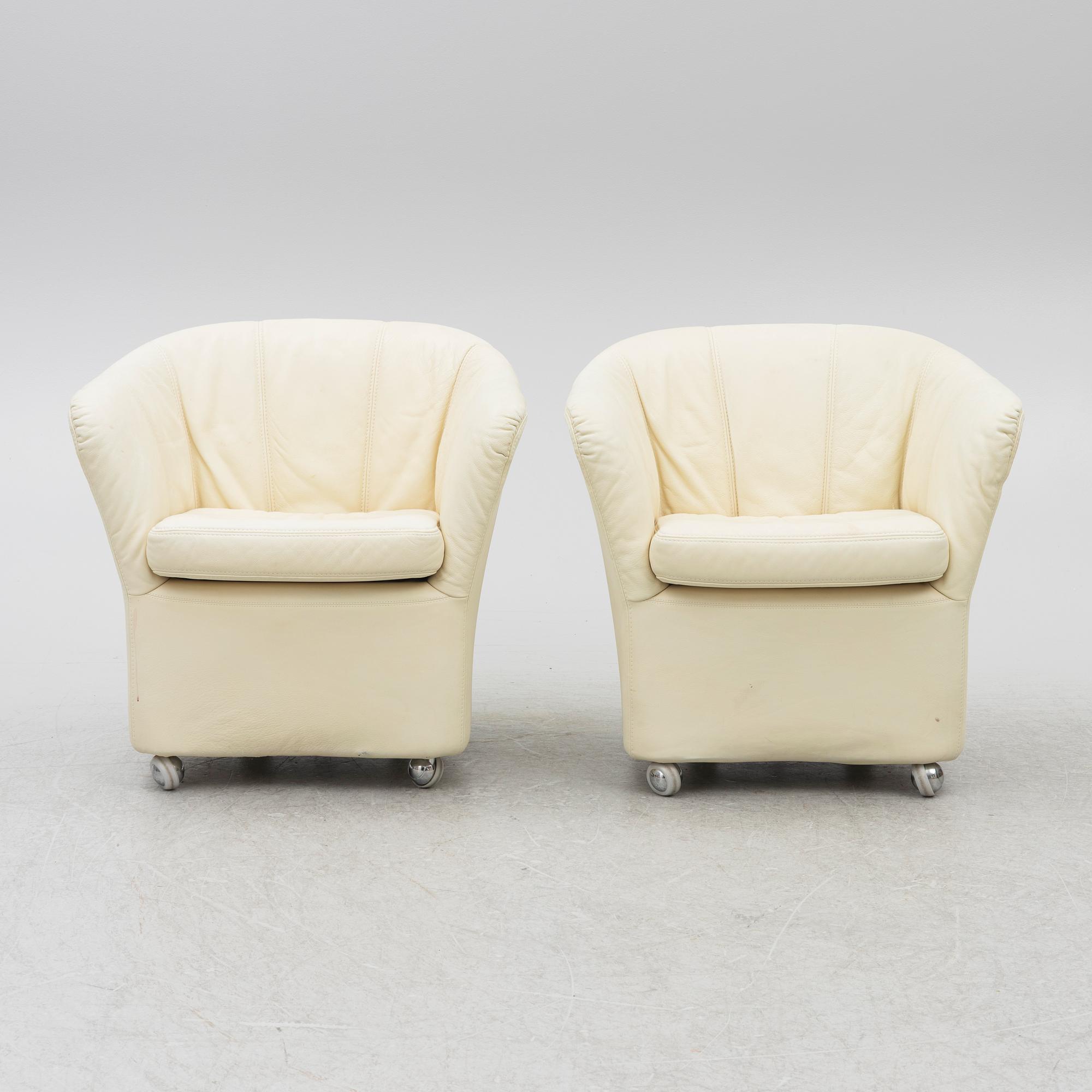 A pair of leather armchairs, Dux, Sweden, 1980's.