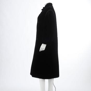 SONIA RYKIEL, a faux fur black coat.