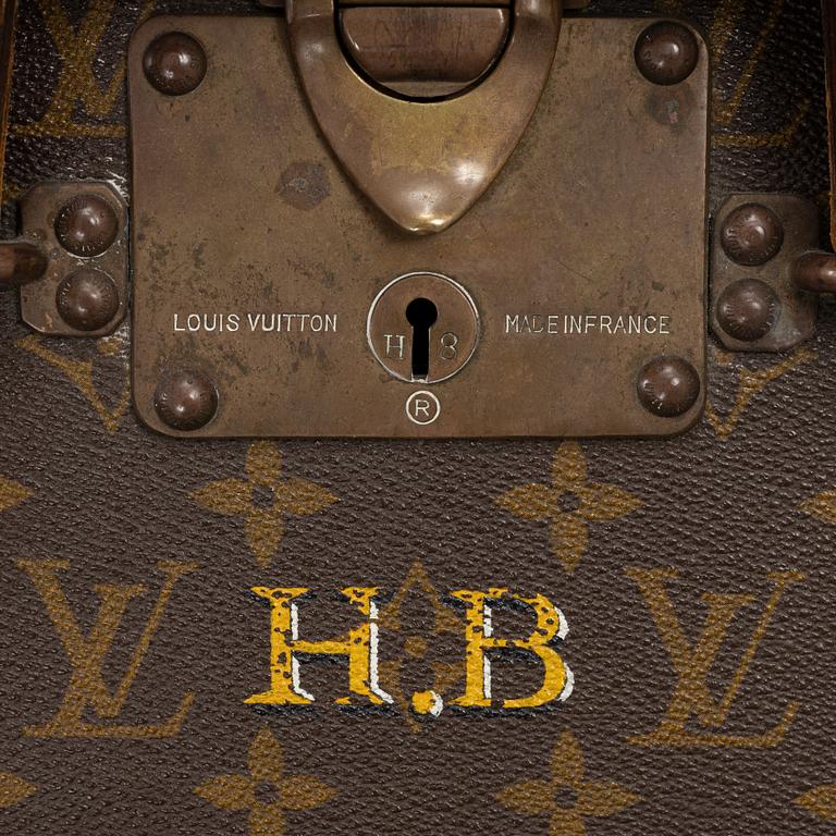 Louis Vuitton, a monogram canvas 'Bracken' suitcase, mid 20th Century.