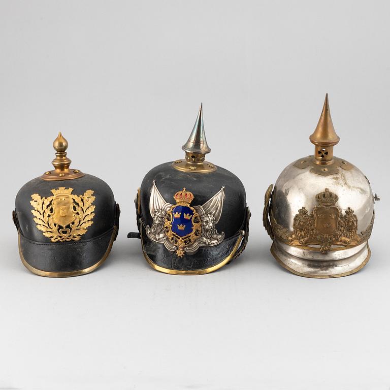 Three Swedish military helmets.