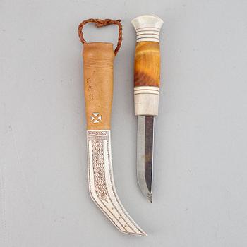Lennart Sammelin, a reindeer horn, birch and leather Sami knife, signed LS.