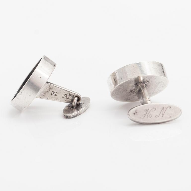 Elis Kauppi, A pair of silver cufflinks with tiger's eye. Kupittaan kulta, Turku 1966.