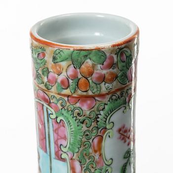 Two famille rose 'Canton' vases with covers, Qing dynasty, 19th century.