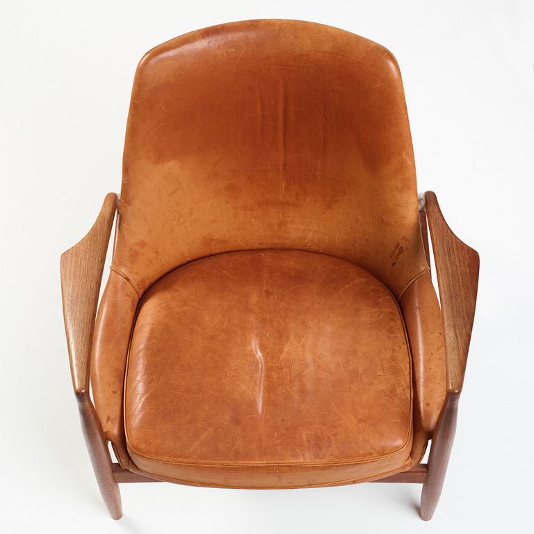 Ib Kofod-Larsen, a "Seal" teak and brown leather armchair, Olof Persson Möbler, Jönköping, Sweden 1950-60's.