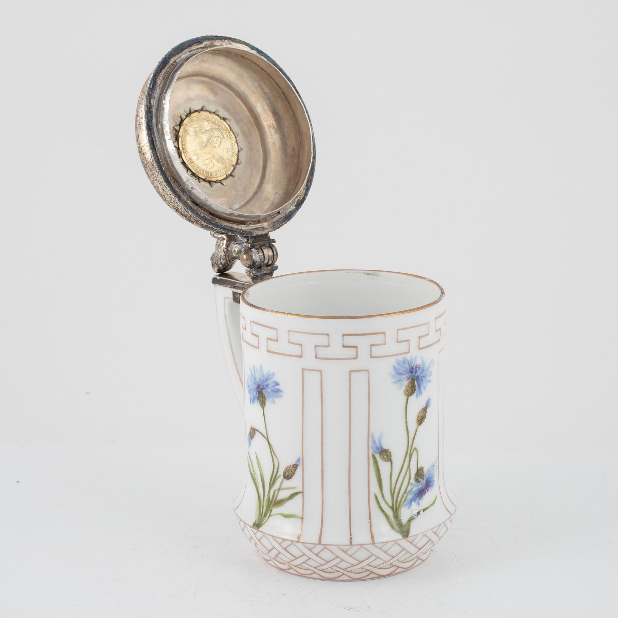 A porcelain tankarnd with older silver mounted lid, Royal Copenhagen, Denmark, 1889-1922.