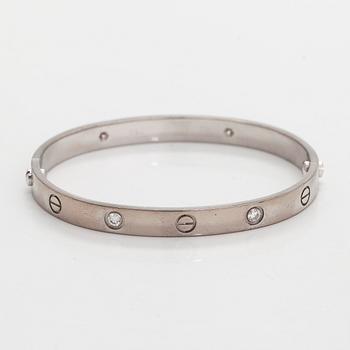 Cartier, rannekoru "Love", 18K valkokultaa, briljanttihiottuja timantteja.