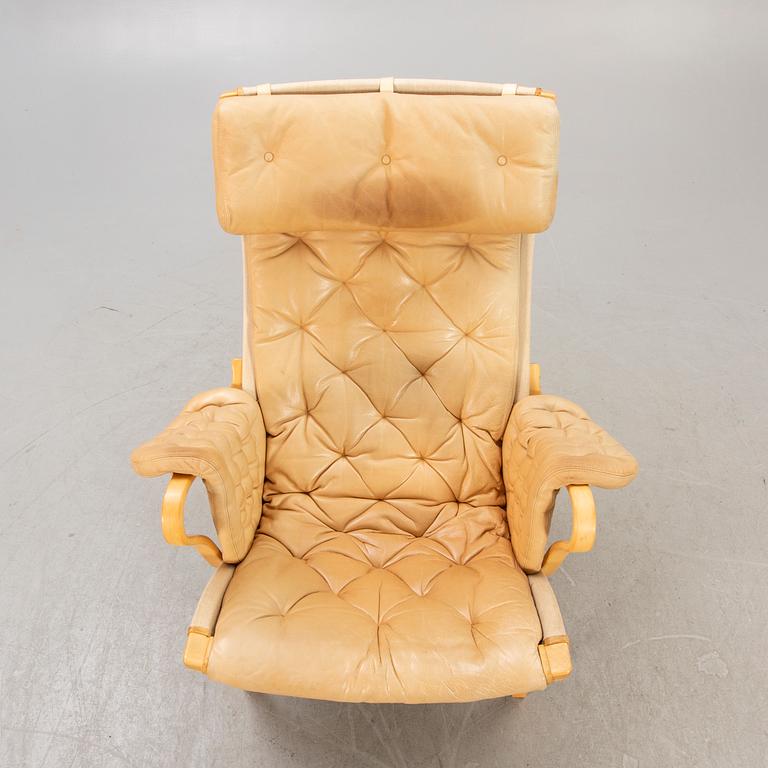 A Bruno Mathsson "Pernilla" leather easy chair for DUX later part of the 20th century.