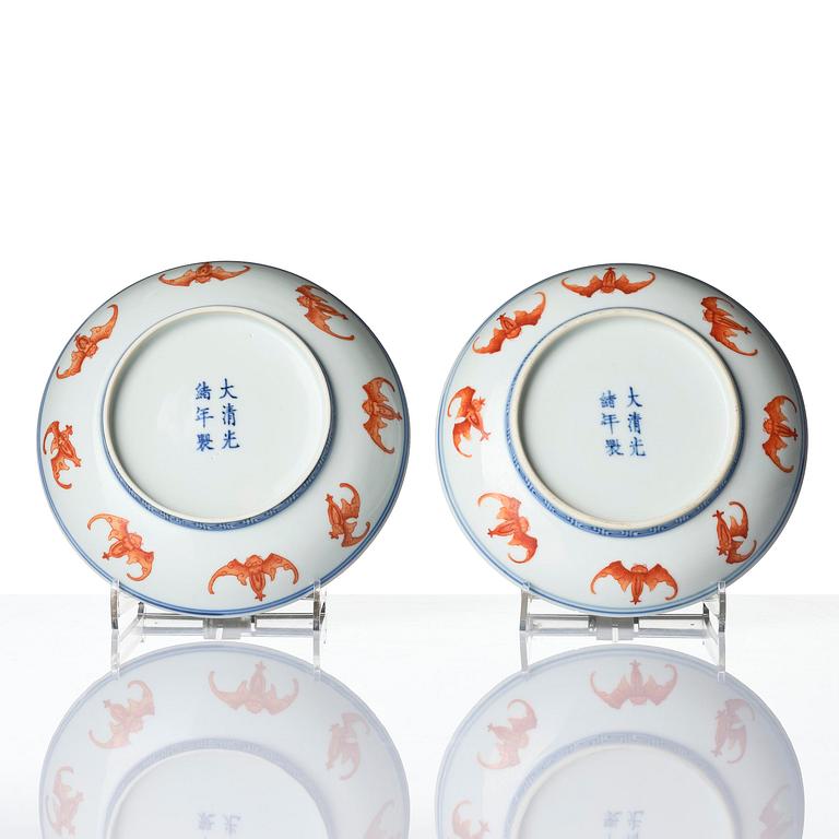 A pair of iron-red decorated 'bats' dishes, Qing dynasty, Guangxu mark and period (1875-1908).
