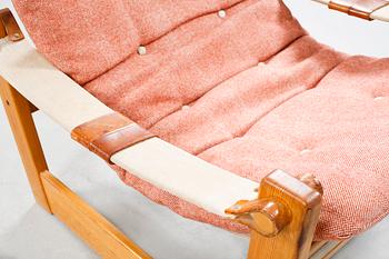 An easy chair with footrest, model "Remo", designed by Yngve Ekström for Swedese Möbler AB 1970.