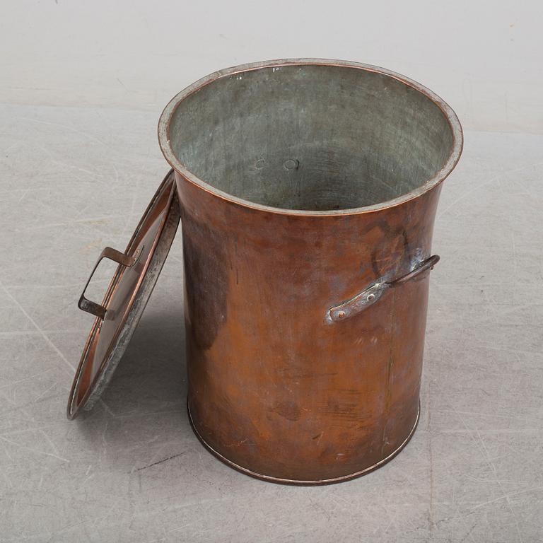 A late 19th century copper barrel.