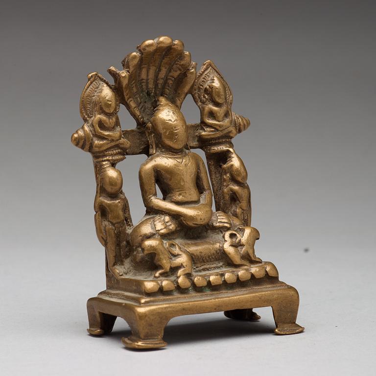 A copper alloy Jain shrine, western India, 19th Century or older. With inscription to the back.