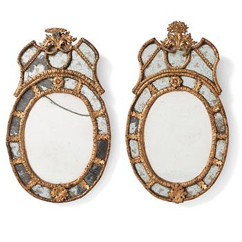 89. A pair of Swedish Baroque girandoles in the manner of B Precht (Stockholm 1674-1738).