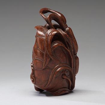 A bamboo carving of a crab and lotus, late Qing dynasty.