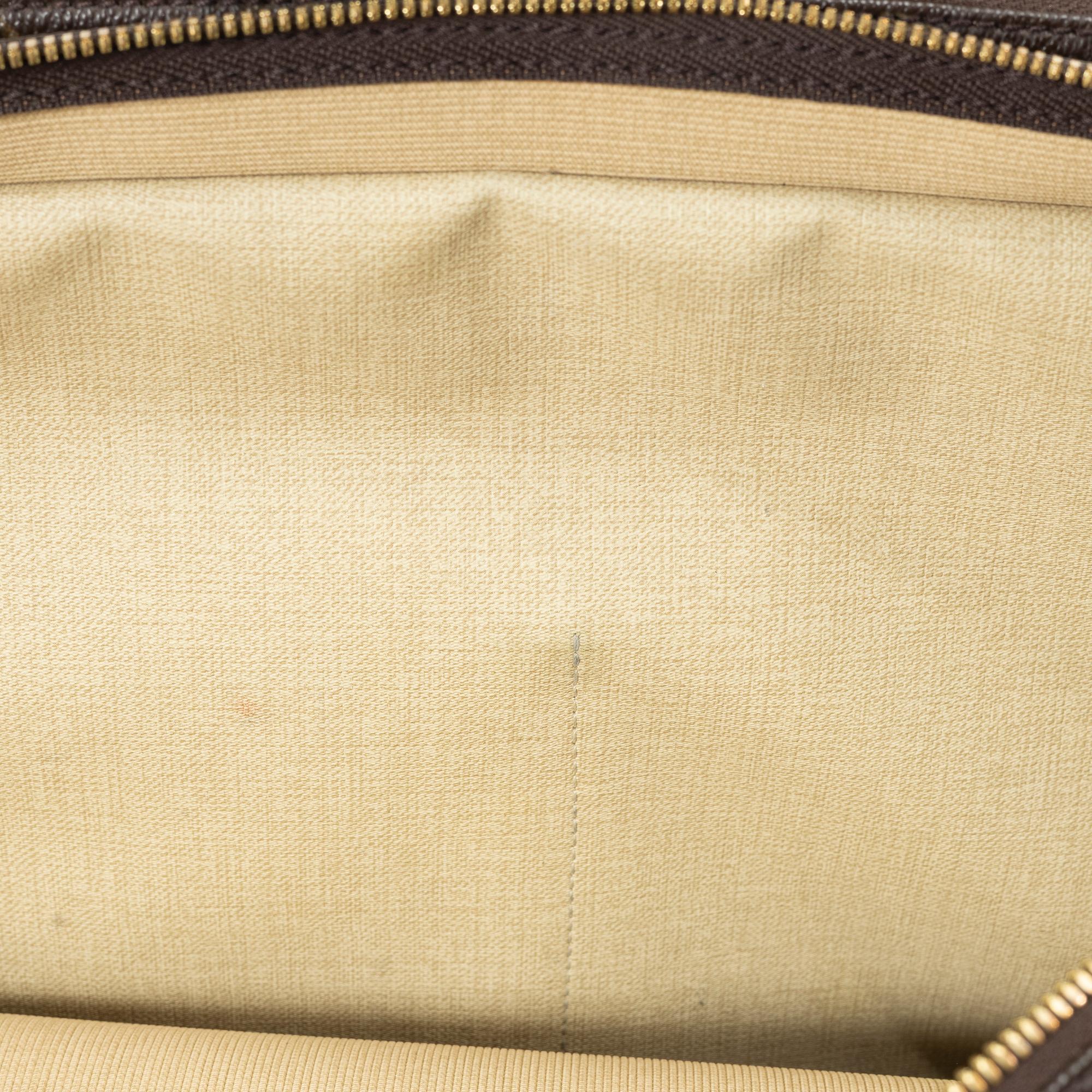 Louis Vuitton, a 'Reporter MM' cross body bag, 2001.