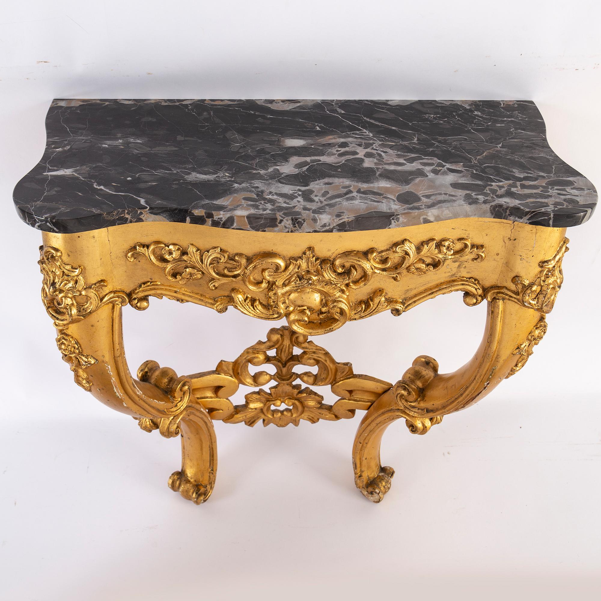 A late 19th century mirror and console table.