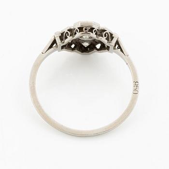 A platinum ring set with round brilliant-cut diamonds and sapphires, Art Déco.