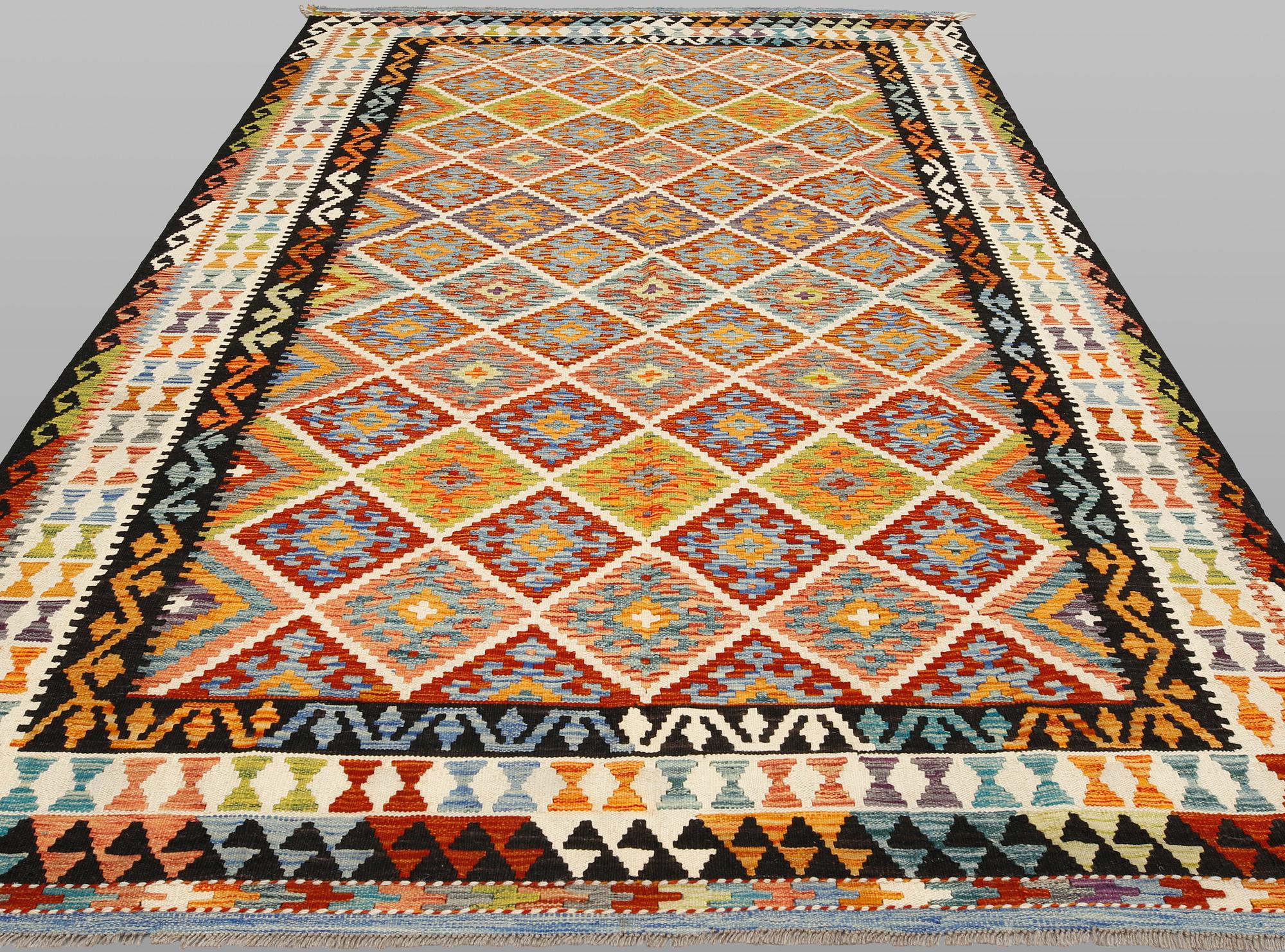 A Kilim carpet, approx. 302 x 203 cm.