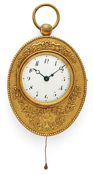 646. An Empire early 19th century gilt bronze carriage clock.