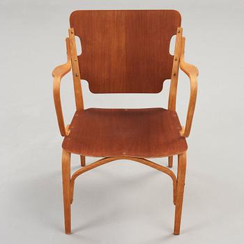 A Carl-Axel Acking beech and mahogany armchair, Svenska Möbelfabrikerna, Bodafors 1940's.