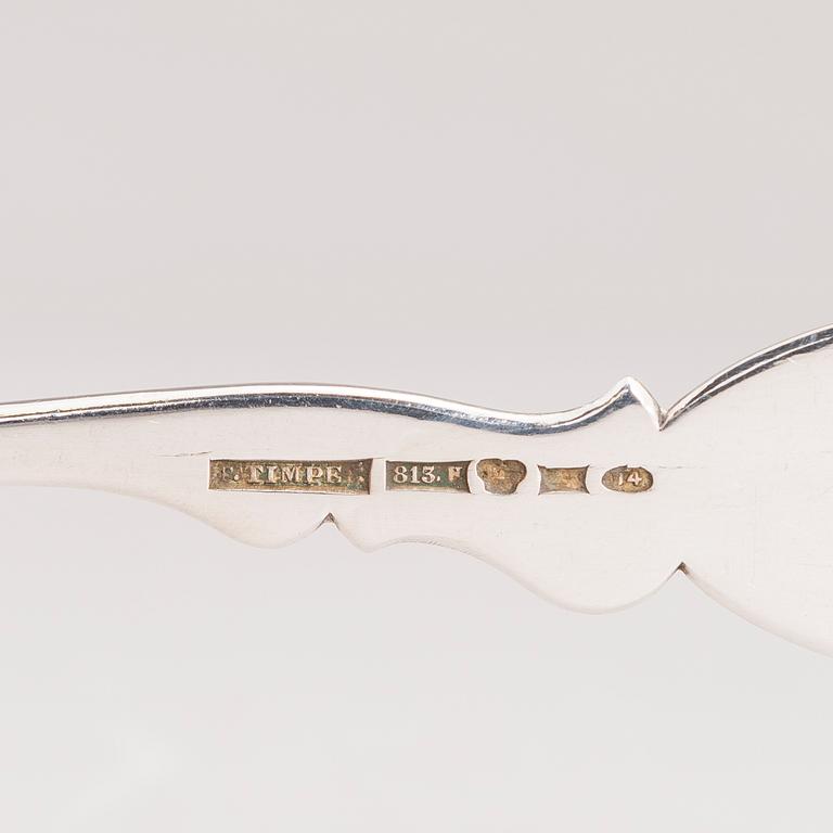 Silver serving cutlery, three with mark of Ferdinand Timper, Helsinki 1901-02 and a pair with German marks, ca. 1900.