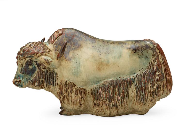 A Kaj Lange stoneware sculpture of a bison, Royal Copenhagen, Denmark 1966.