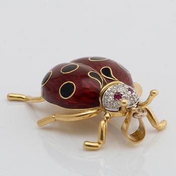 PENSANT 18k gold, brilliant-cut diamonds, 2 rubies and enamel, approx 4 x 3 cm.
