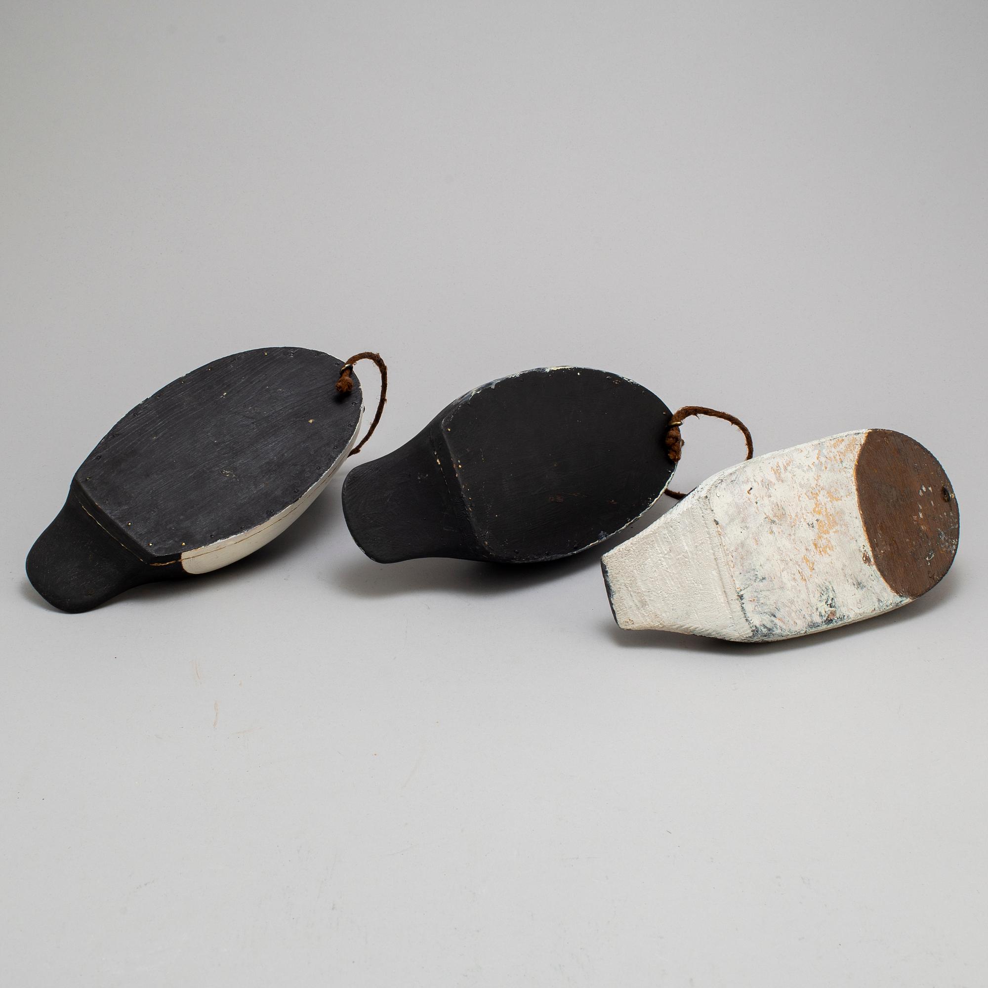 Three early 20th century painted wood birds.