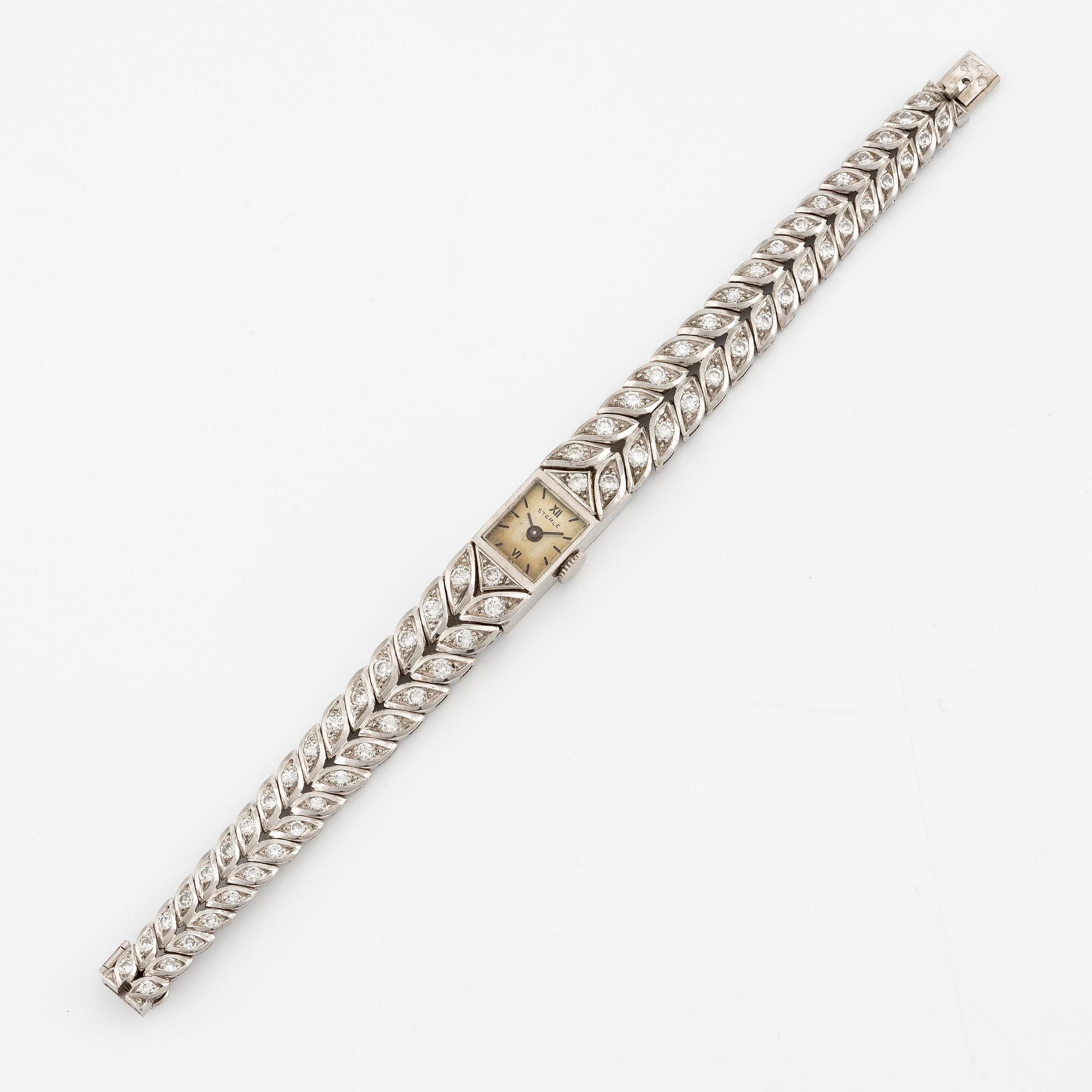 Sterlé armbandsur platina med runda briljantslipade diamanter.