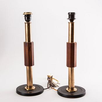 A pair of wood and brass table lamps later part of the 20th century.