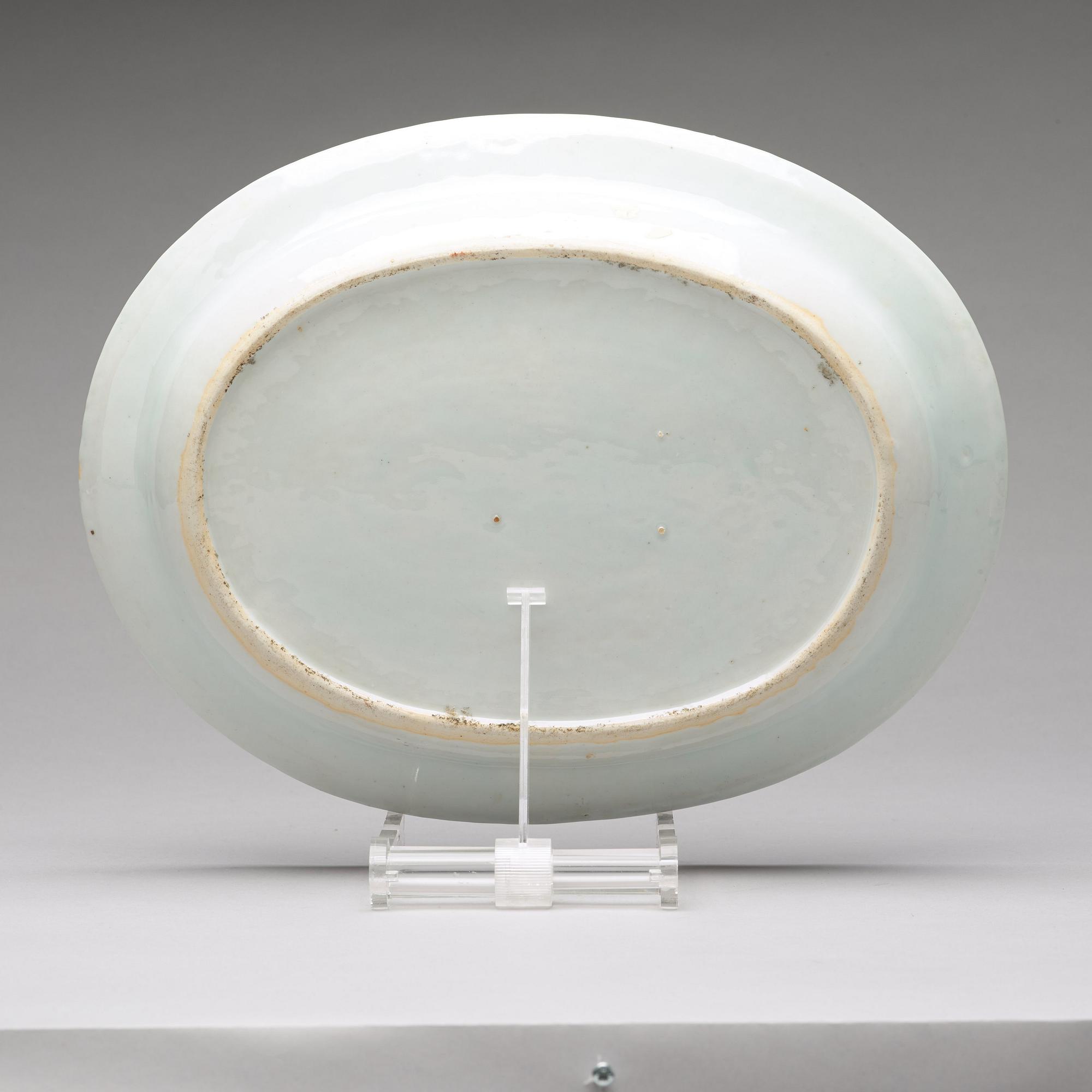 A famille rose 'double peacock' serving dish, Qing dynasty, Qianlong (1736-95).