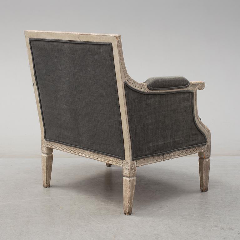 A second half of the 20th century Gustavian style easy chair.